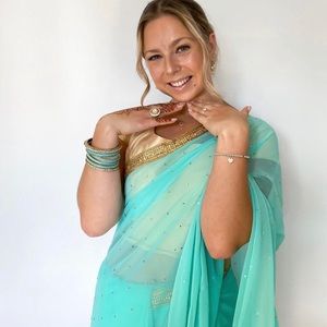 Teal Blue sari / saree with gold blouse, skirt and bangles